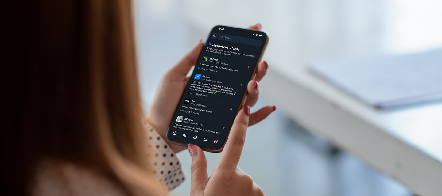 Woman reading Bluesky feed on phone