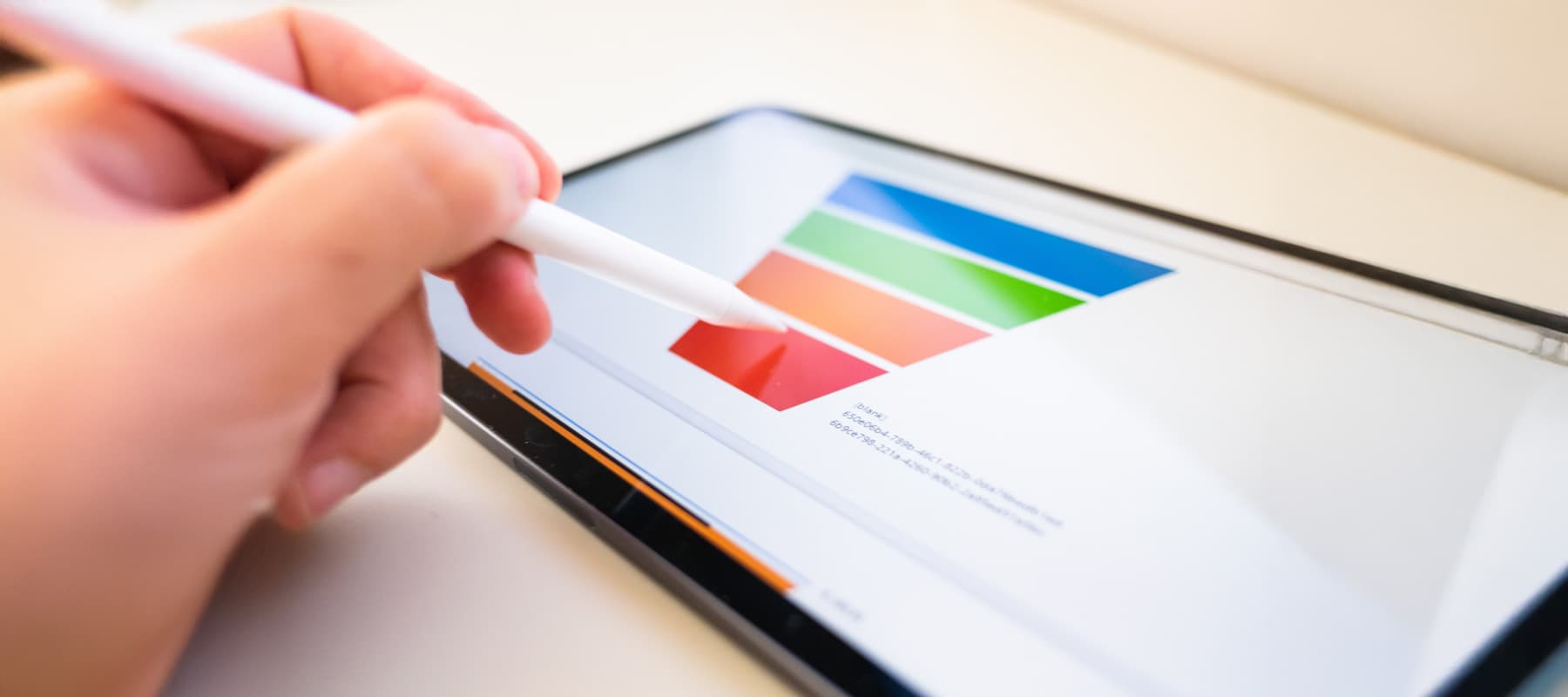 AI generated content image of a person using their stylus on a tablet with a bright business funnel chart